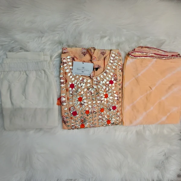 \Traditional women’s beige embroidered kurta with dupatta and lace pants