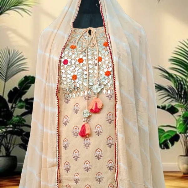 Stylish cream kurta set with embroidery and lace detailing, paired with dupatta