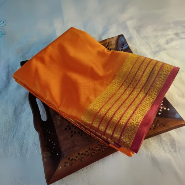 Elegant Orange Semi Mysore South Crepe Saree with Maroon Zari Border